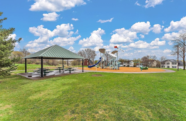 community play area with a gazebo and a yard