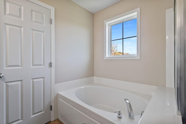 bathroom with a bath