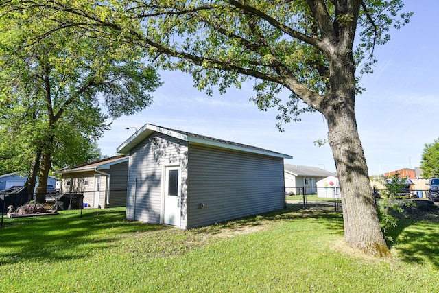 405 State Ave N, Thief River Falls, MN 56701 - view of home's exterior with an outbuilding