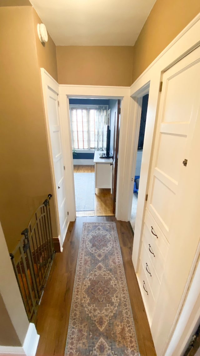 hall with dark wood finished floors