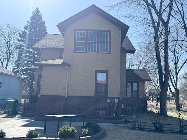 view of front of home featuring stucco siding