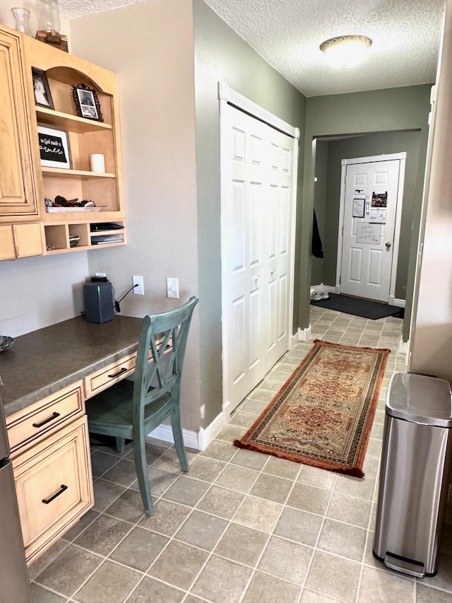 32661 County Road 16, Ross, MN 56751 - tiled office space featuring built in study area, a textured ceiling, and baseboards