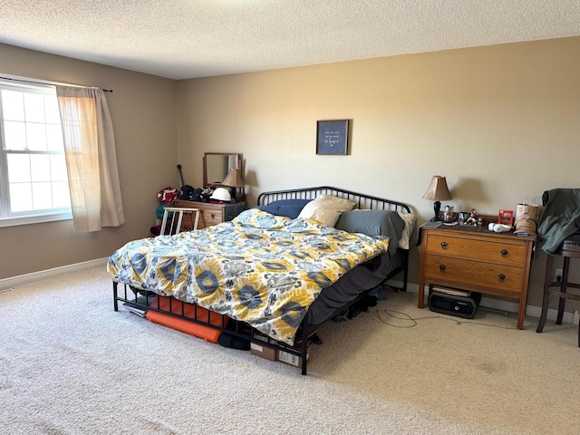 32661 County Road 16, Ross, MN 56751 - carpeted bedroom featuring a textured ceiling and baseboards