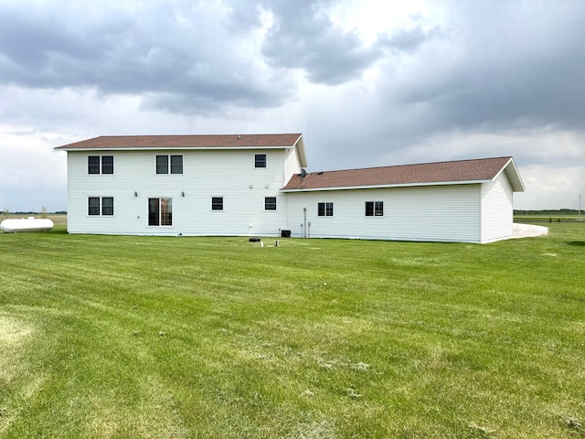 32661 County Road 16, Ross, MN 56751 - back of house with a yard
