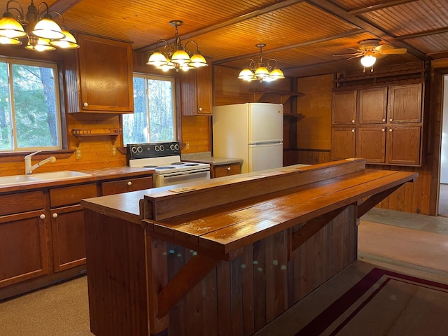40884 Nature Ave, Fleming Twp, MN 56431 - kitchen featuring white appliances, wood ceiling, a chandelier, wooden counters, and a sink