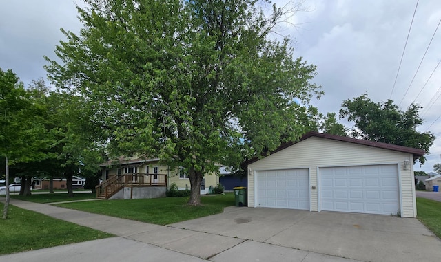 421 7th Ave SE, Pipestone, MN 56164 - view of front facade with an outbuilding, a garage, and a front yard