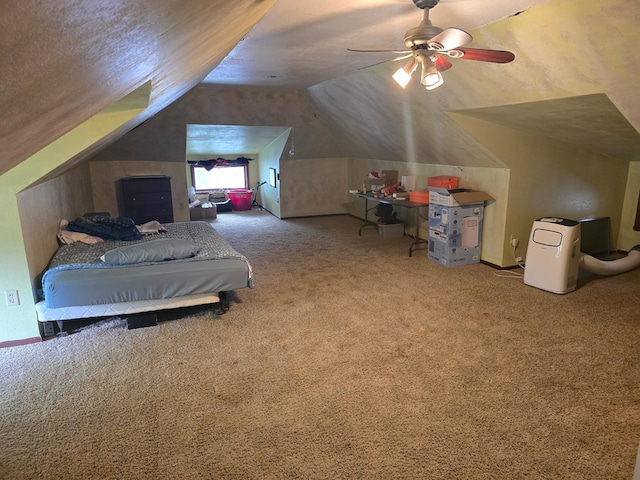 421 7th Ave SE, Pipestone, MN 56164 - bedroom with vaulted ceiling, carpet floors, and a ceiling fan