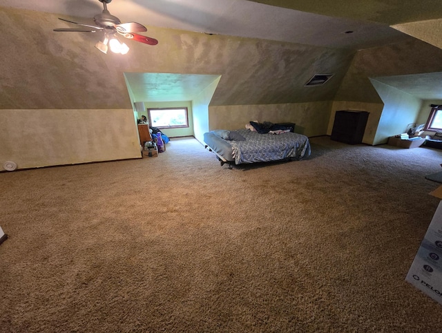 421 7th Ave SE, Pipestone, MN 56164 - bedroom featuring lofted ceiling, carpet, and a ceiling fan