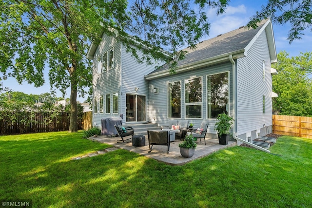 4022 Yosemite Ave S, Saint Louis Park, MN 55416 - rear view of house with an outdoor living space, a fenced backyard, a yard, and a patio