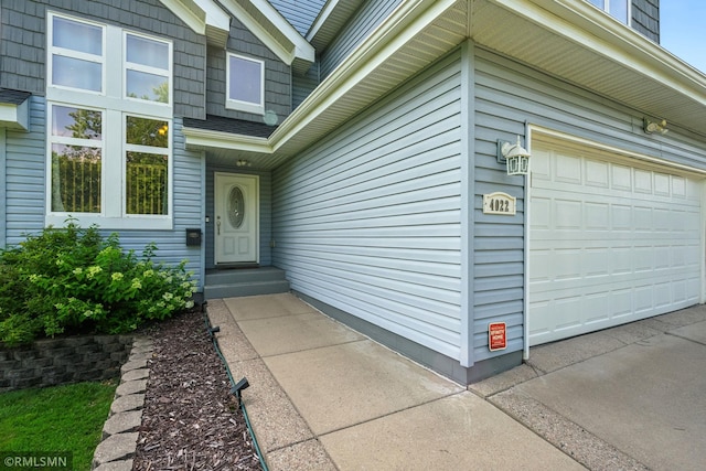 4022 Yosemite Ave S, Saint Louis Park, MN 55416 - view of exterior entry featuring driveway