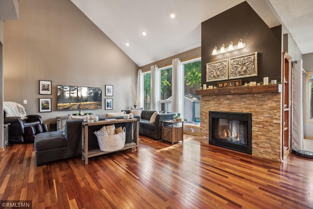 4022 Yosemite Ave S, Saint Louis Park, MN 55416 - living room with high vaulted ceiling, hardwood / wood-style flooring, recessed lighting, and a fireplace