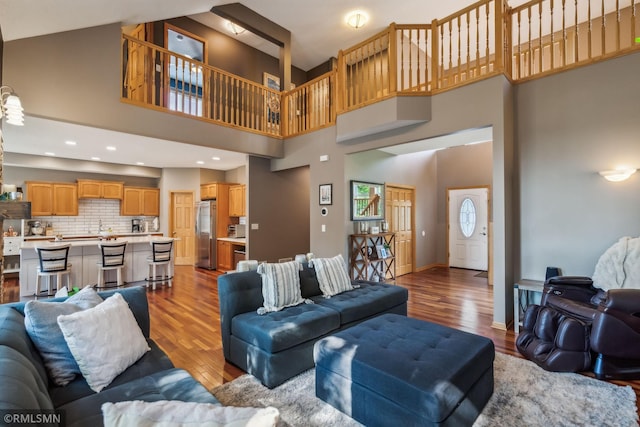 4022 Yosemite Ave S, Saint Louis Park, MN 55416 - living room with recessed lighting, a towering ceiling, wood finished floors, and baseboards