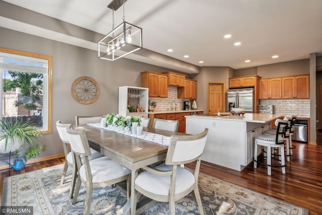 4022 Yosemite Ave S, Saint Louis Park, MN 55416 - dining area with recessed lighting, baseboards, dark wood-type flooring, and a notable chandelier