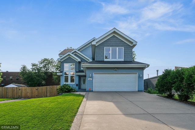 4022 Yosemite Ave S, Saint Louis Park, MN 55416 - view of front of property featuring a garage, driveway, a front yard, and fence
