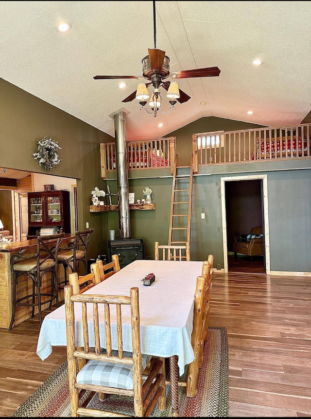 38985 337th Ln, Aitkin, MN 56431 - dining space featuring lofted ceiling, ceiling fan, wood finished floors, a textured ceiling, and recessed lighting