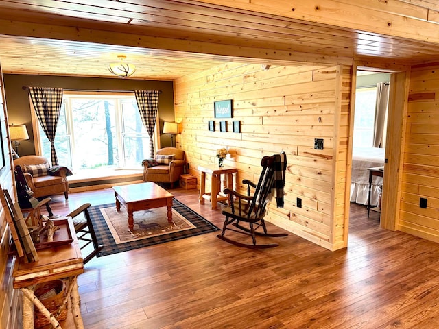 38985 337th Ln, Aitkin, MN 56431 - living area featuring wood walls, wooden ceiling, and wood finished floors