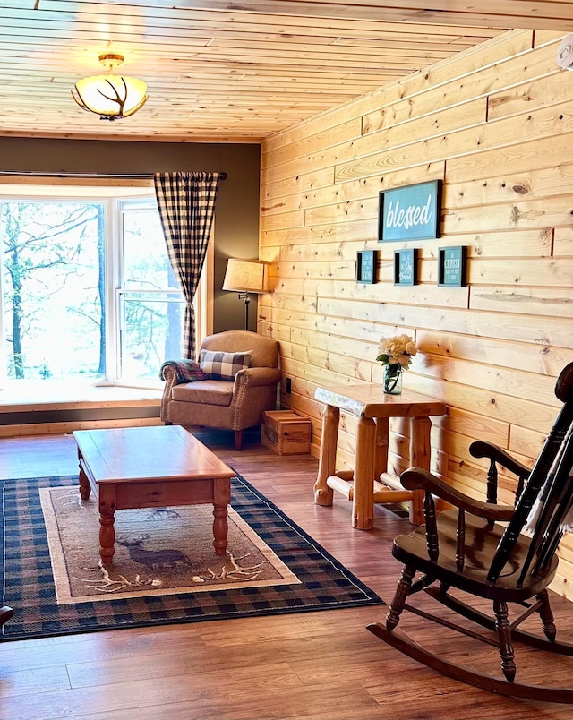 38985 337th Ln, Aitkin, MN 56431 - living area featuring wood ceiling, wood finished floors, and wooden walls