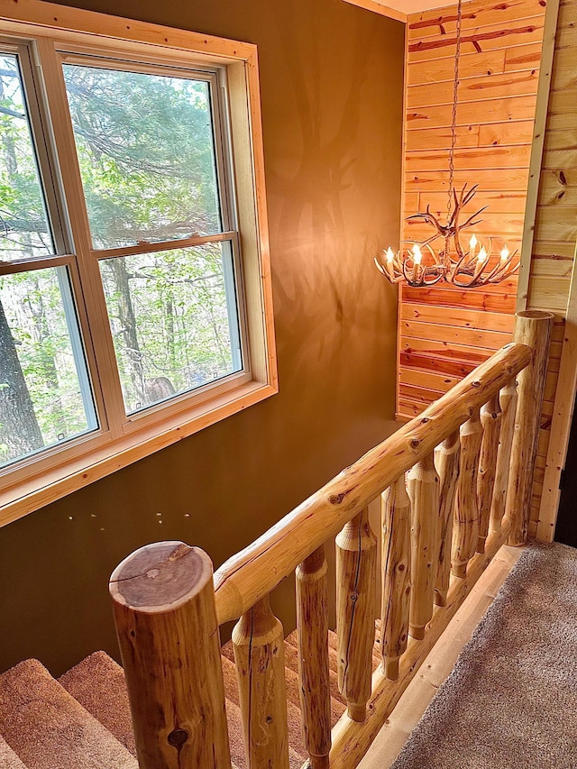 38985 337th Ln, Aitkin, MN 56431 - stairway with a chandelier and plenty of natural light