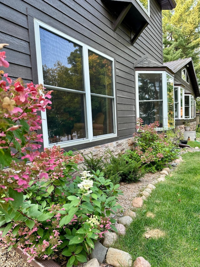 38985 337th Ln, Aitkin, MN 56431 - view of side of property with stone siding