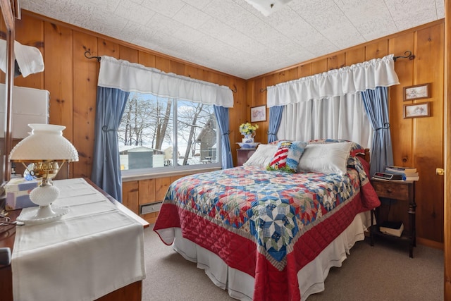 42271 Vista Road, East Side Twp, MN 56342 - carpeted bedroom featuring wood walls