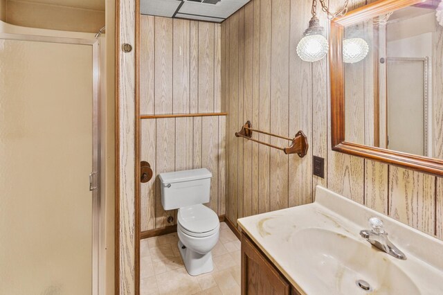 409 Dale Dr SE, Remer, MN 56672 - bathroom with a stall shower, vanity, tile patterned flooring, and wooden walls