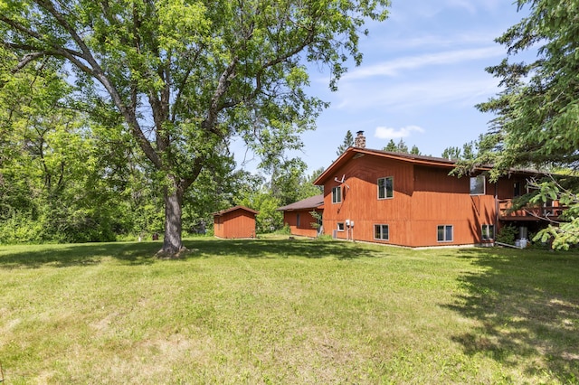 409 Dale Dr SE, Remer, MN 56672 - view of grassy yard featuring a storage shed