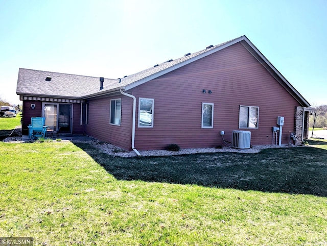 902 Meadow Lark Ln, Long Prairie, MN 56347 - view of side of property featuring a yard and central air condition unit