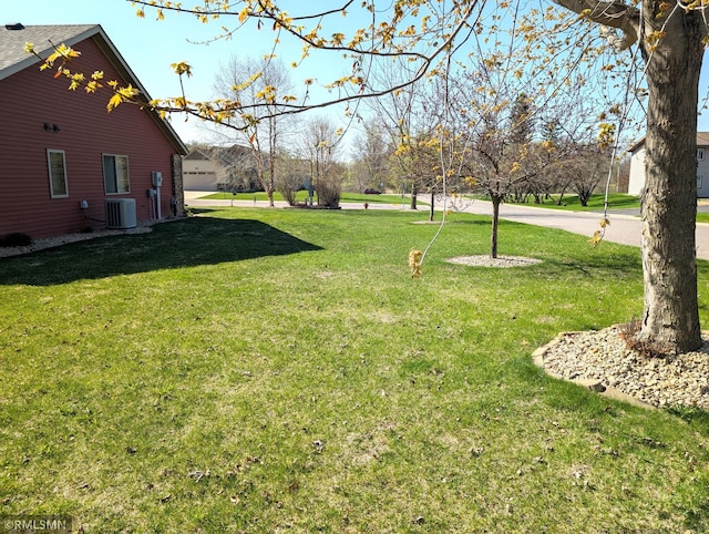 902 Meadow Lark Ln, Long Prairie, MN 56347 - view of green lawn with central AC unit