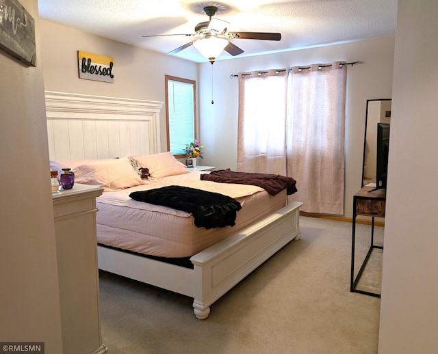902 Meadow Lark Ln, Long Prairie, MN 56347 - bedroom with light colored carpet and a ceiling fan
