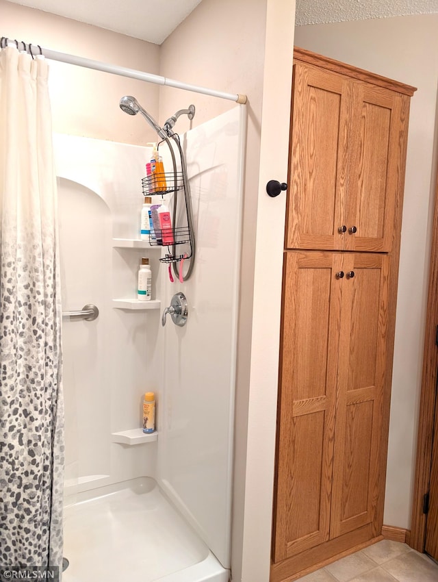 902 Meadow Lark Ln, Long Prairie, MN 56347 - full bathroom featuring a shower with curtain and tile patterned flooring