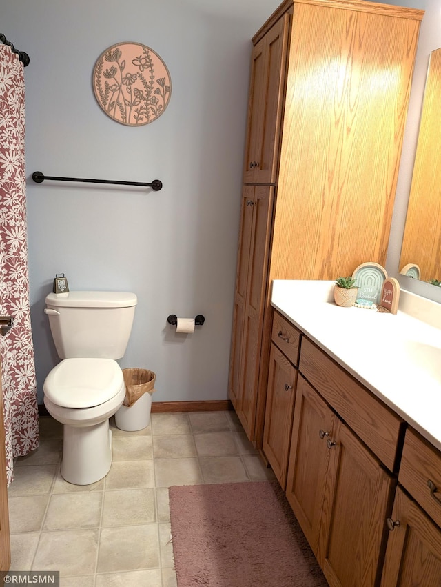 902 Meadow Lark Ln, Long Prairie, MN 56347 - full bathroom with toilet, baseboards, and vanity