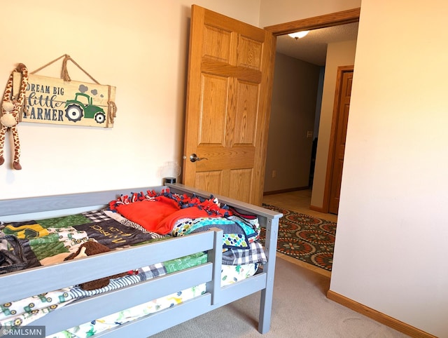 902 Meadow Lark Ln, Long Prairie, MN 56347 - bedroom with carpet flooring and baseboards