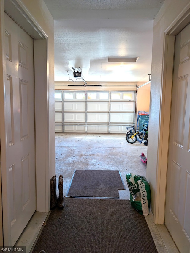 902 Meadow Lark Ln, Long Prairie, MN 56347 - garage with a garage door opener