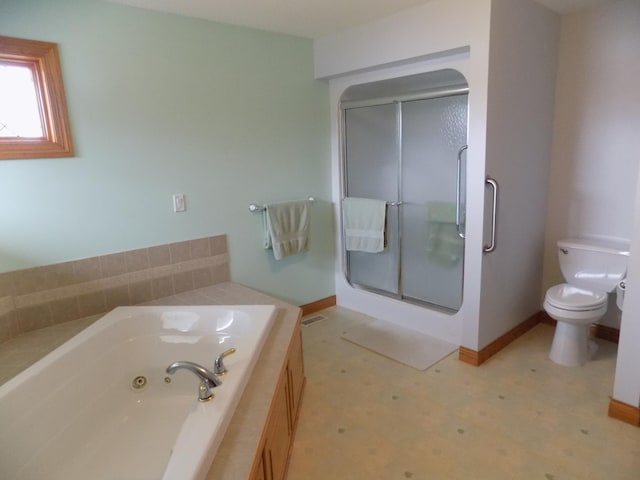 full bath featuring a shower stall, a tub with jets, toilet, tile patterned floors, and baseboards