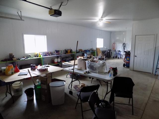 garage featuring a garage door opener and ceiling fan