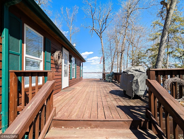 wooden deck with area for grilling