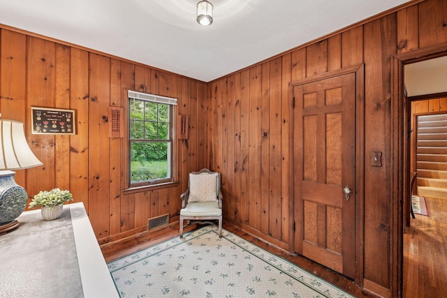 19135 Highland Ave, Deephaven, MN 55391 - living area with wood finished floors and wood walls