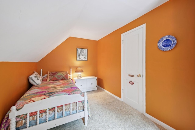 19135 Highland Ave, Deephaven, MN 55391 - bedroom with light colored carpet and lofted ceiling