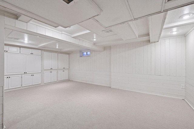 19135 Highland Ave, Deephaven, MN 55391 - basement with light carpet and wooden walls