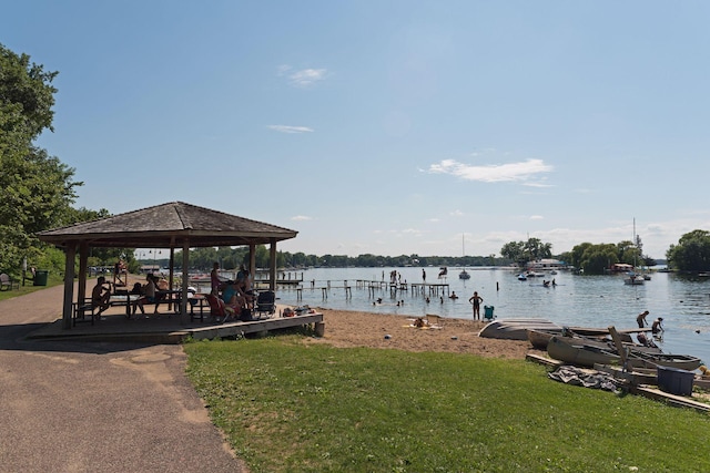 19135 Highland Ave, Deephaven, MN 55391 - dock area featuring a gazebo, a lawn, and a water view