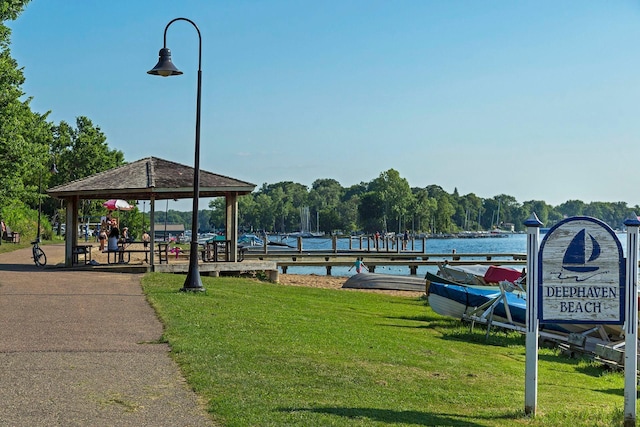 19135 Highland Ave, Deephaven, MN 55391 - view of home's community with a gazebo, a lawn, a dock, and a water view