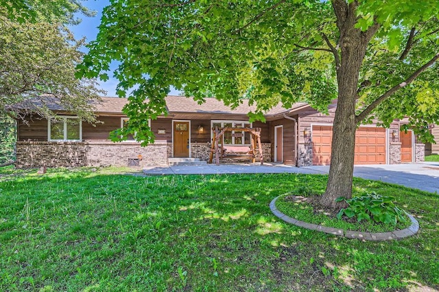 7488 Hydram Ave S, Cottage Grove, MN 55016 - view of front of house featuring a front yard, an attached garage, and asphalt driveway