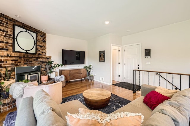 7488 Hydram Ave S, Cottage Grove, MN 55016 - living area with wood finished floors, baseboards, and recessed lighting