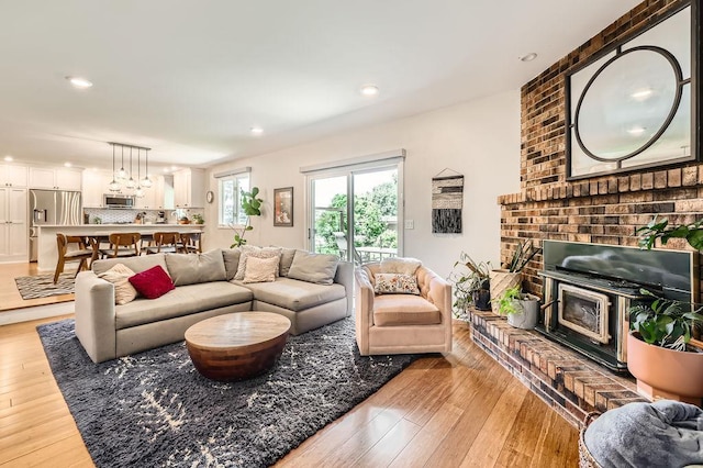 7488 Hydram Ave S, Cottage Grove, MN 55016 - living room featuring light wood-style floors and recessed lighting