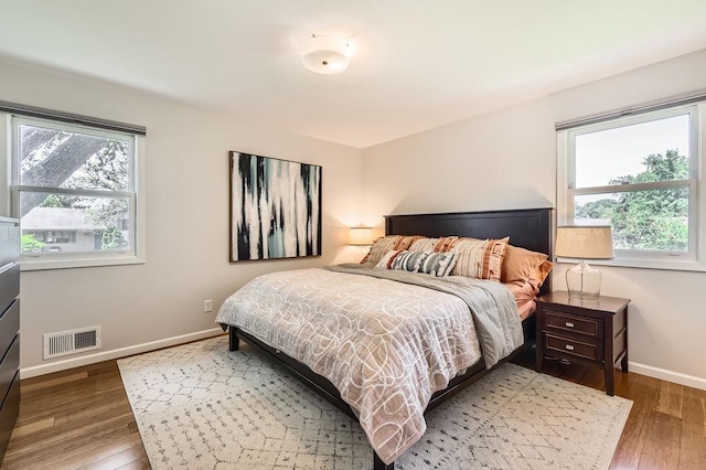7488 Hydram Ave S, Cottage Grove, MN 55016 - bedroom with baseboards and wood finished floors