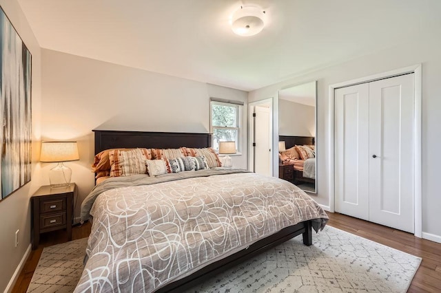 7488 Hydram Ave S, Cottage Grove, MN 55016 - bedroom featuring wood finished floors and baseboards