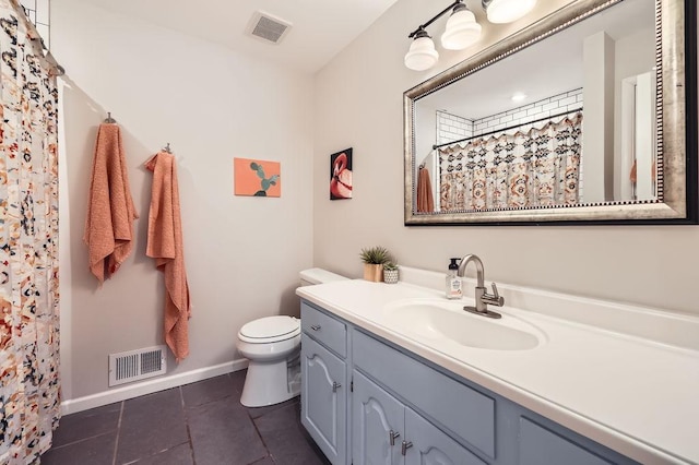 7488 Hydram Ave S, Cottage Grove, MN 55016 - bathroom with vanity, toilet, tile patterned floors, baseboards, and a shower with shower curtain