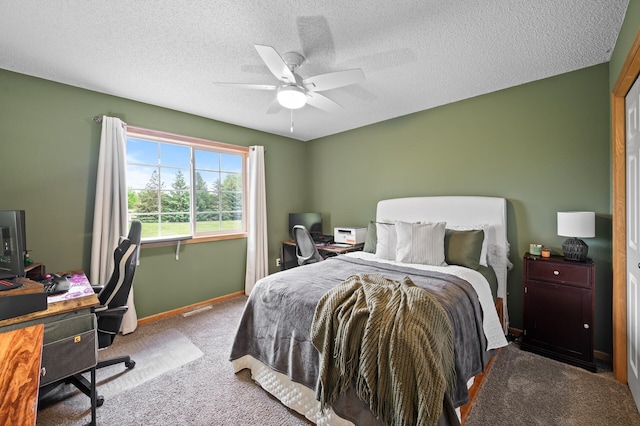 1324 Pembrooke Ln, Waconia, MN 55387 - bedroom with an office area, carpet, a textured ceiling, and a ceiling fan