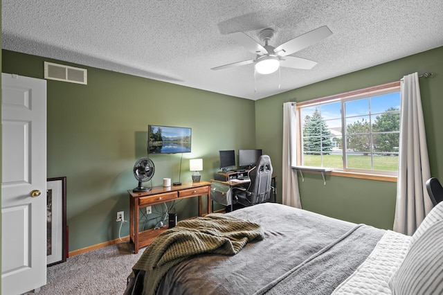 1324 Pembrooke Ln, Waconia, MN 55387 - bedroom with carpet flooring, a textured ceiling, and ceiling fan