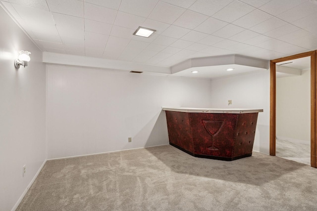 bar featuring carpet flooring and a dry bar